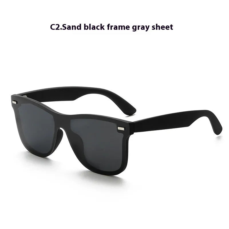 Polarised sunglasses with grey lenses and a sand black TR90 frame suitable for outdoor sports.