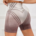 Women's high-waisted gradient fitness shorts in black colour for yoga and running