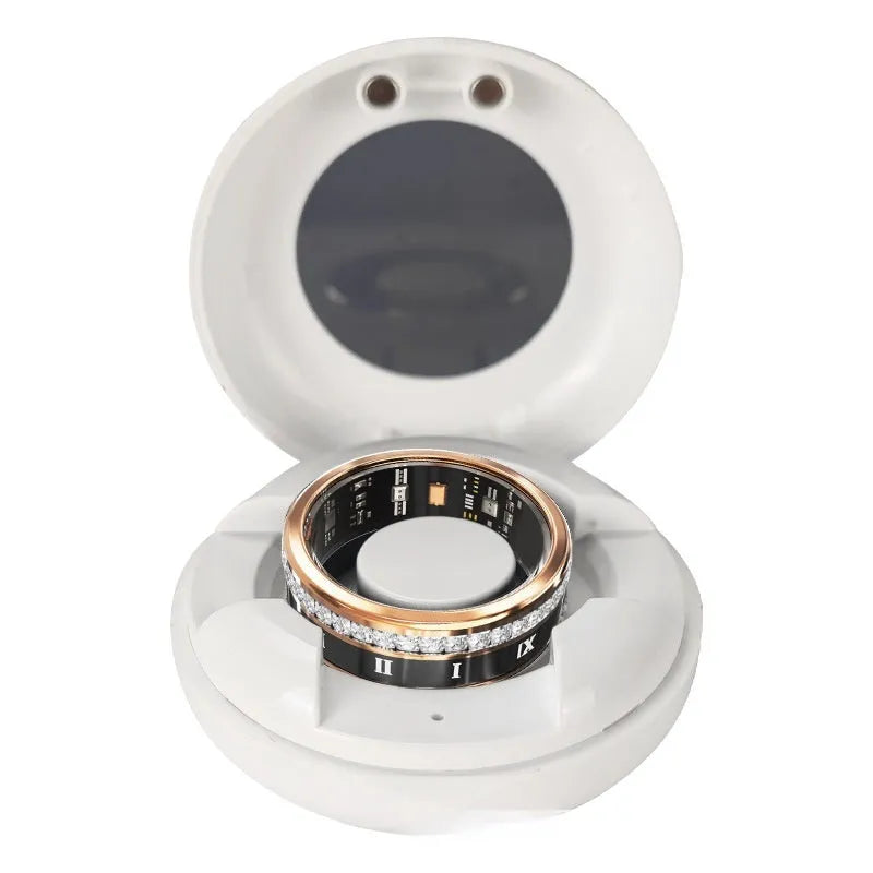 Silver and gold smart ring with diamond inlay on a finger, showing its wearable design and jewellery aesthetic.