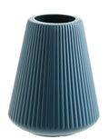 A simple style melamine plastic decorative flower vase in blue, measuring 16cm by 20cm, on a desktop.