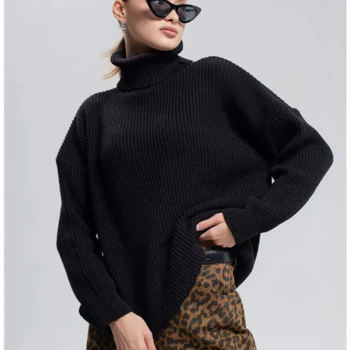Women's solid colour high neck loose fit pullover sweater on a hanger