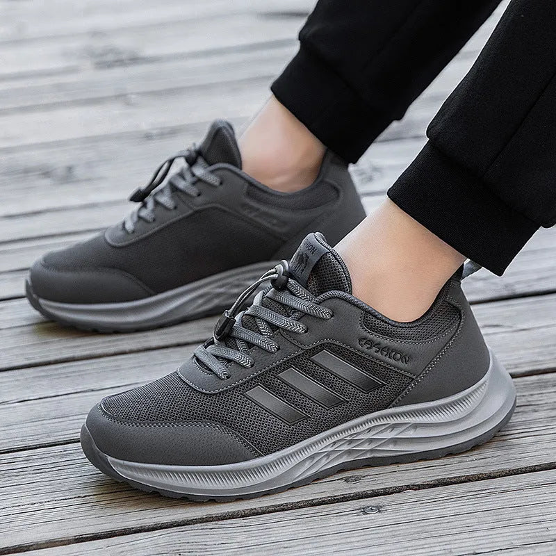 Men's and women's elastic band slip-on casual shoes in mesh material, showing colour options.