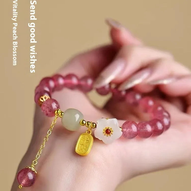 Handcrafted strawberry quartz crystal bracelet for women with natural style and multiple charm options