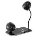 White desk lamp with integrated digital clock display and wireless charging pad surface