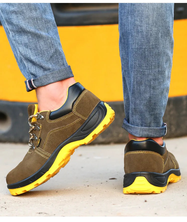 Bronze cowhide leather low-cut safety boots with a steel toe cap and solid rubber tread sole.