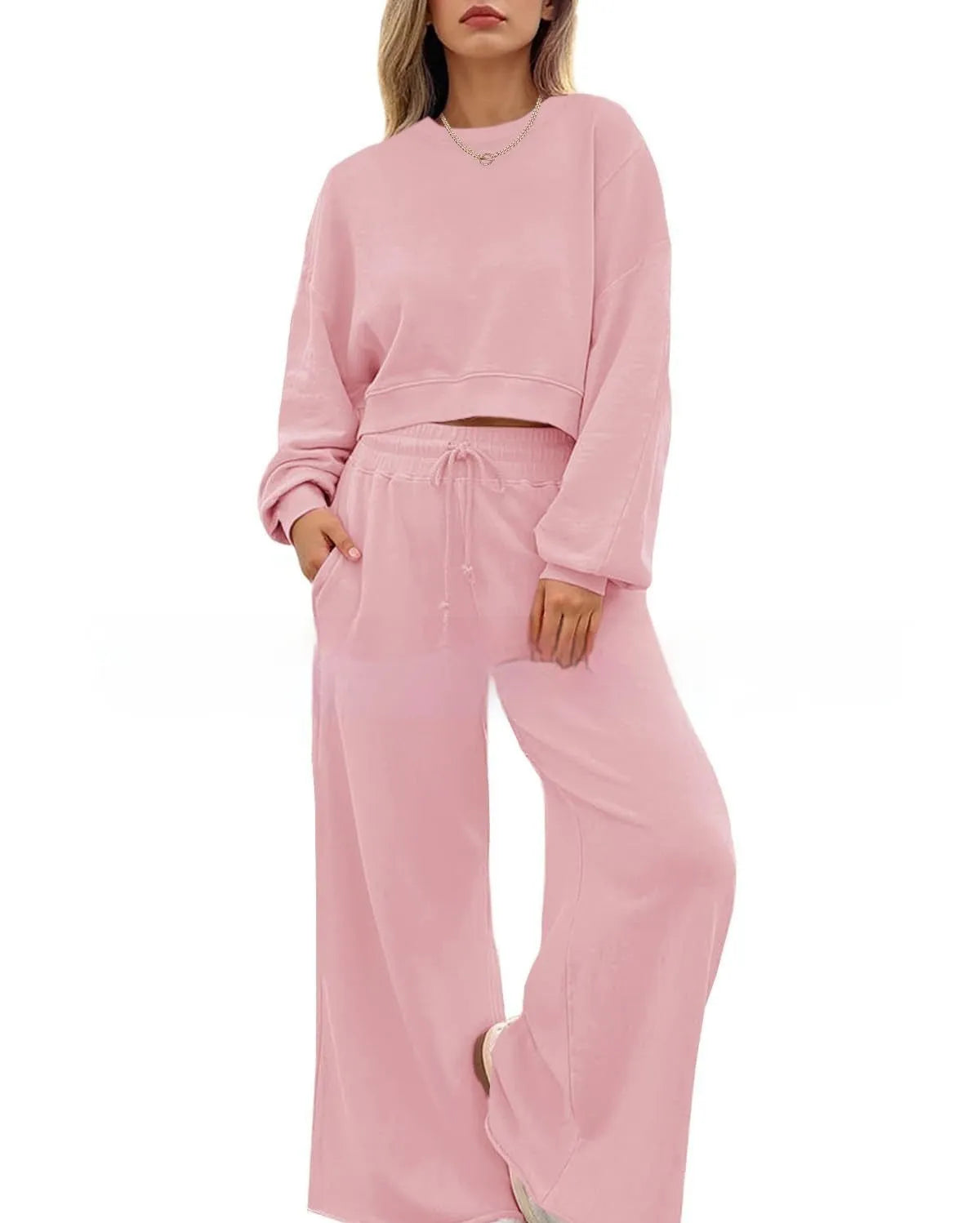 Women's solid colour polyester long sleeve top and trouser two-piece set in street hipster style.