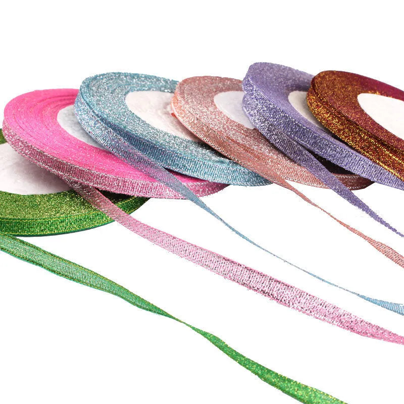 Roll of narrow 0.6cm wide polyester gift wrapping ribbon in assorted colours, showing 22 metre length.