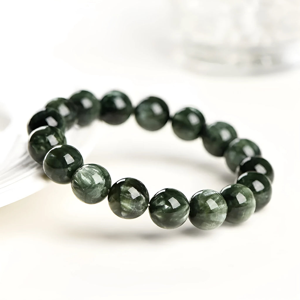 Natural green dragon crystal bracelet with 8-9mm round beads and Ruyi decorative elements