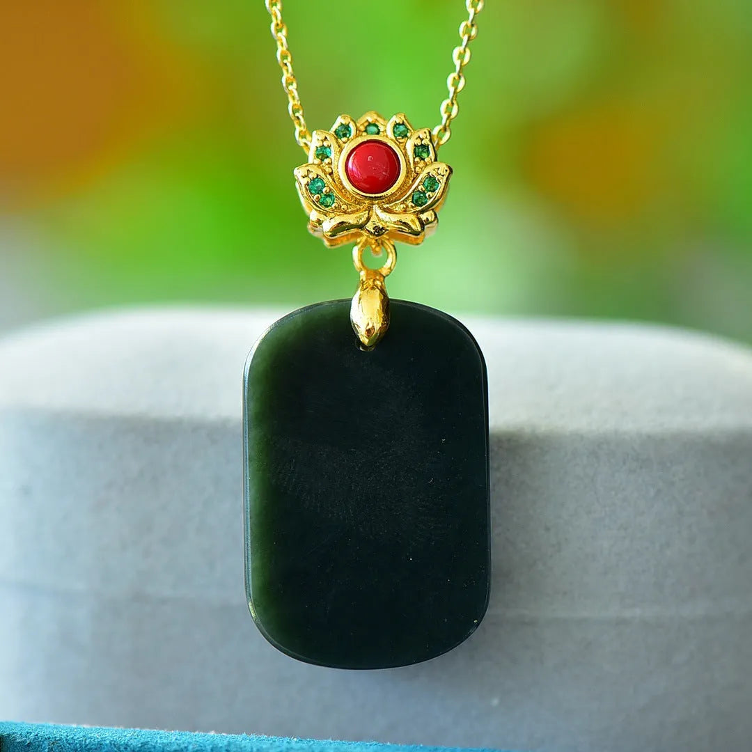 Flat grey Hetian jade pendant with copper wire inlay on an 18-inch chain.