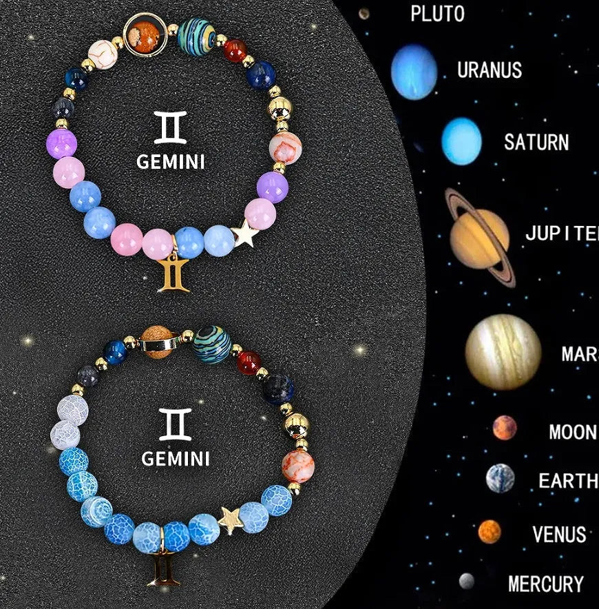 Two adjustable natural stone beaded bracelets with metal zodiac sign charms on a wooden surface.