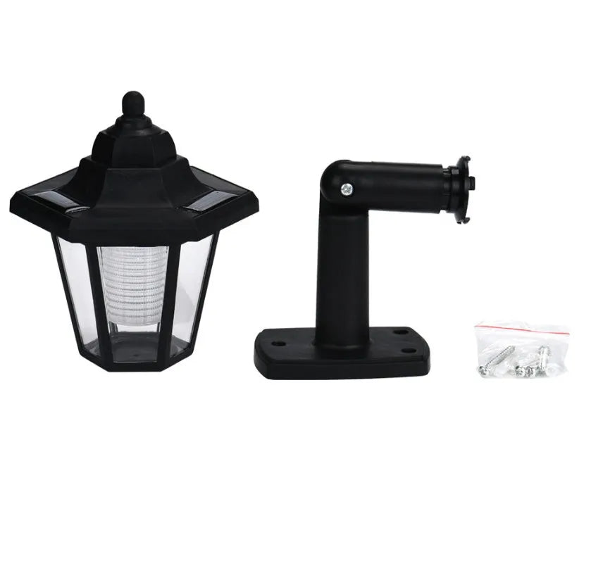 Black hexagonal solar wall light with IP44 waterproof rating for outdoor use