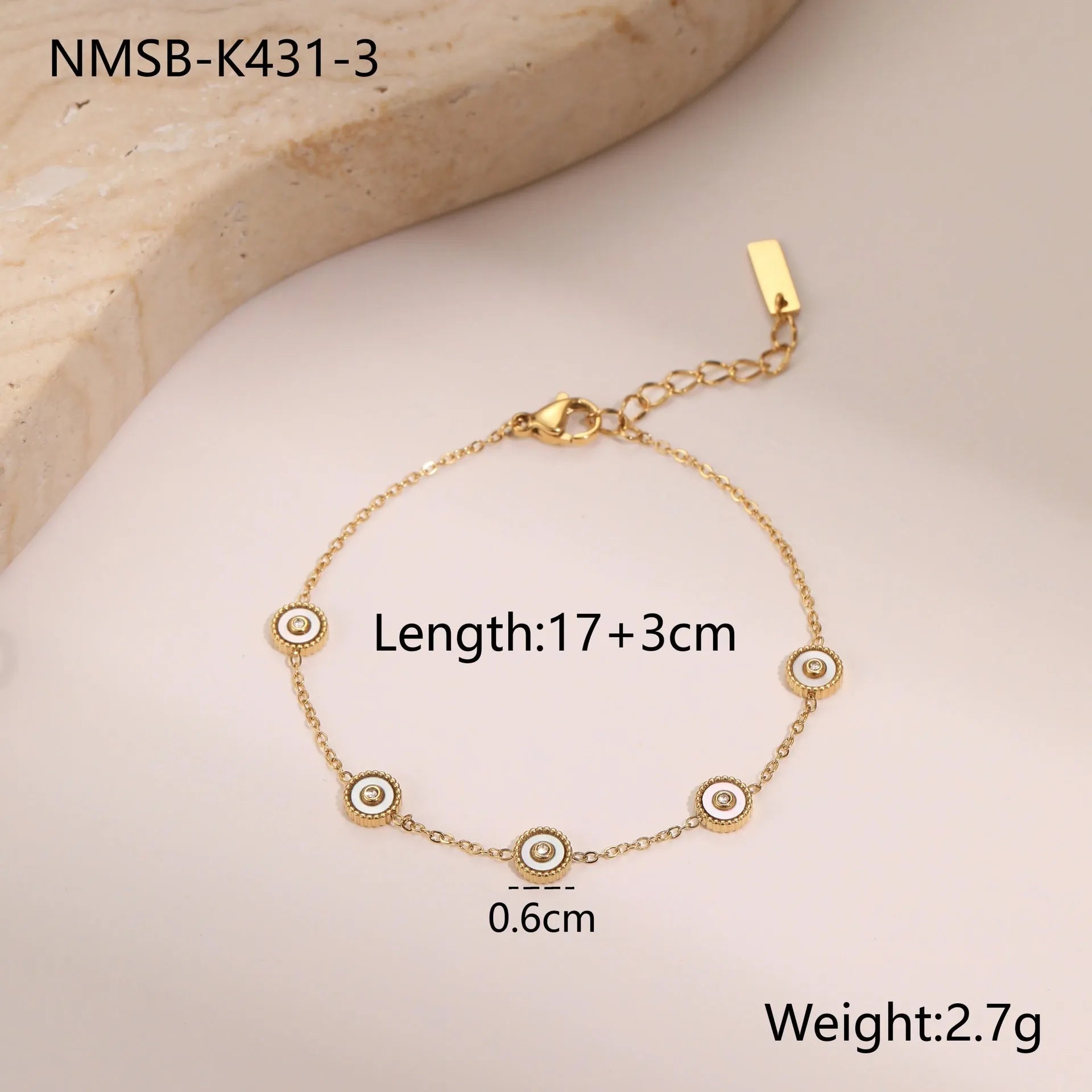 Geometric fritillary pattern stainless steel bracelet with 18K gold plating and matching necklace