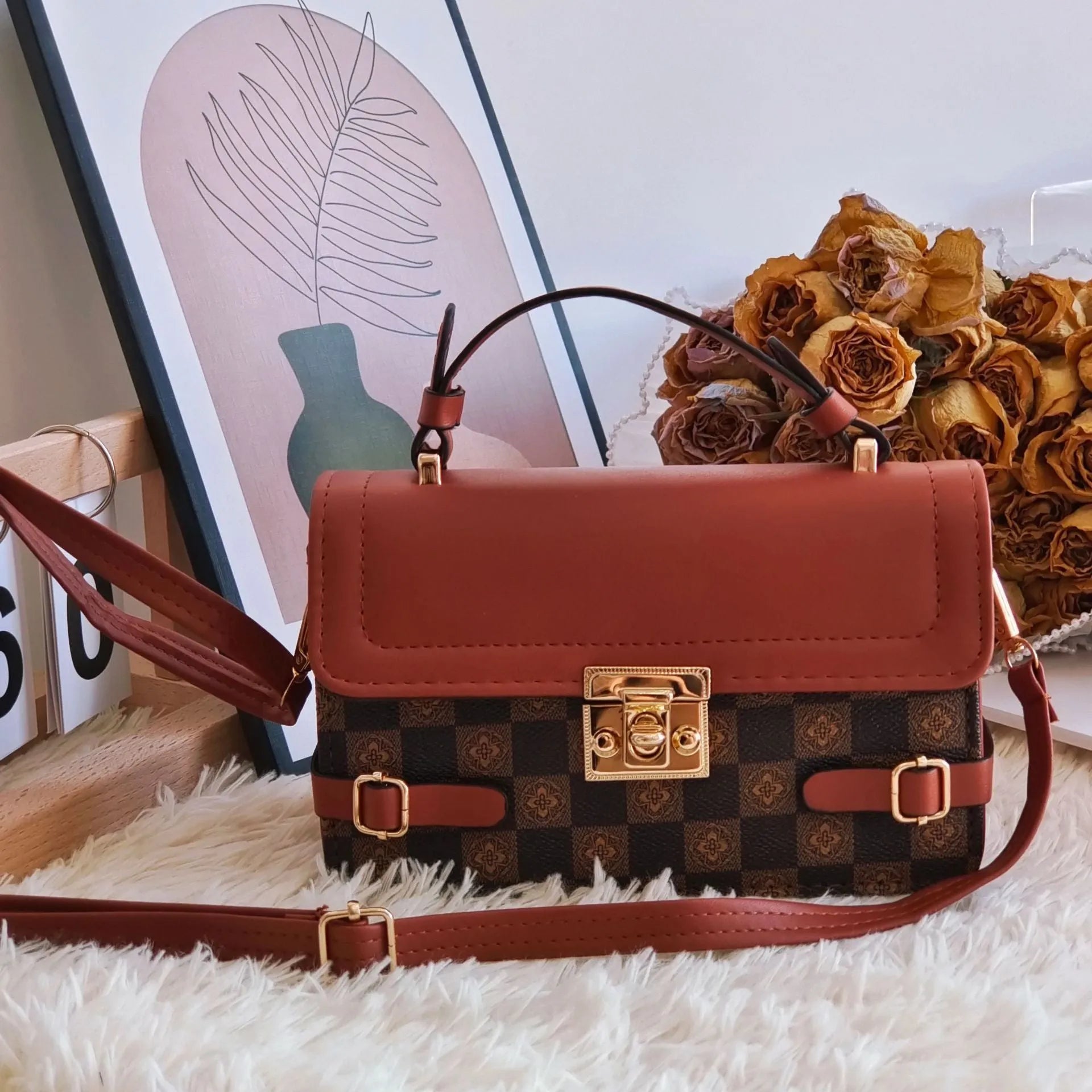 Retro square crossbody bag with ethnic floral stitch patterns and horizontal suitcase shape