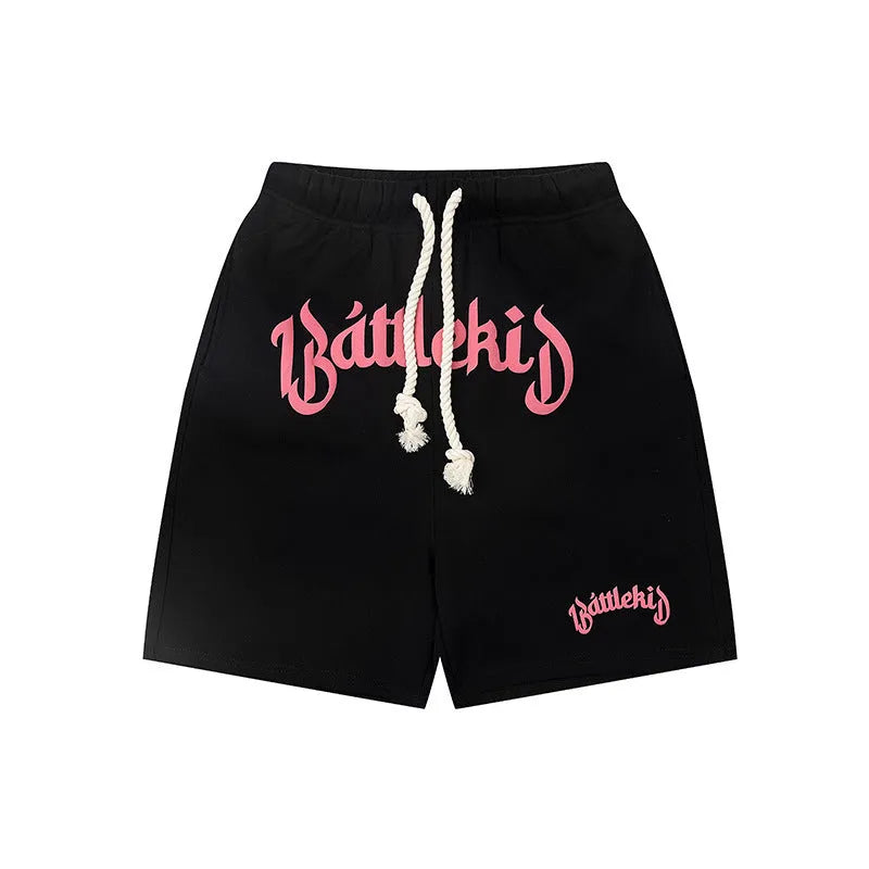 Loose fit cropped sweatpants in cotton-blended fabric on hanger, showing street style design