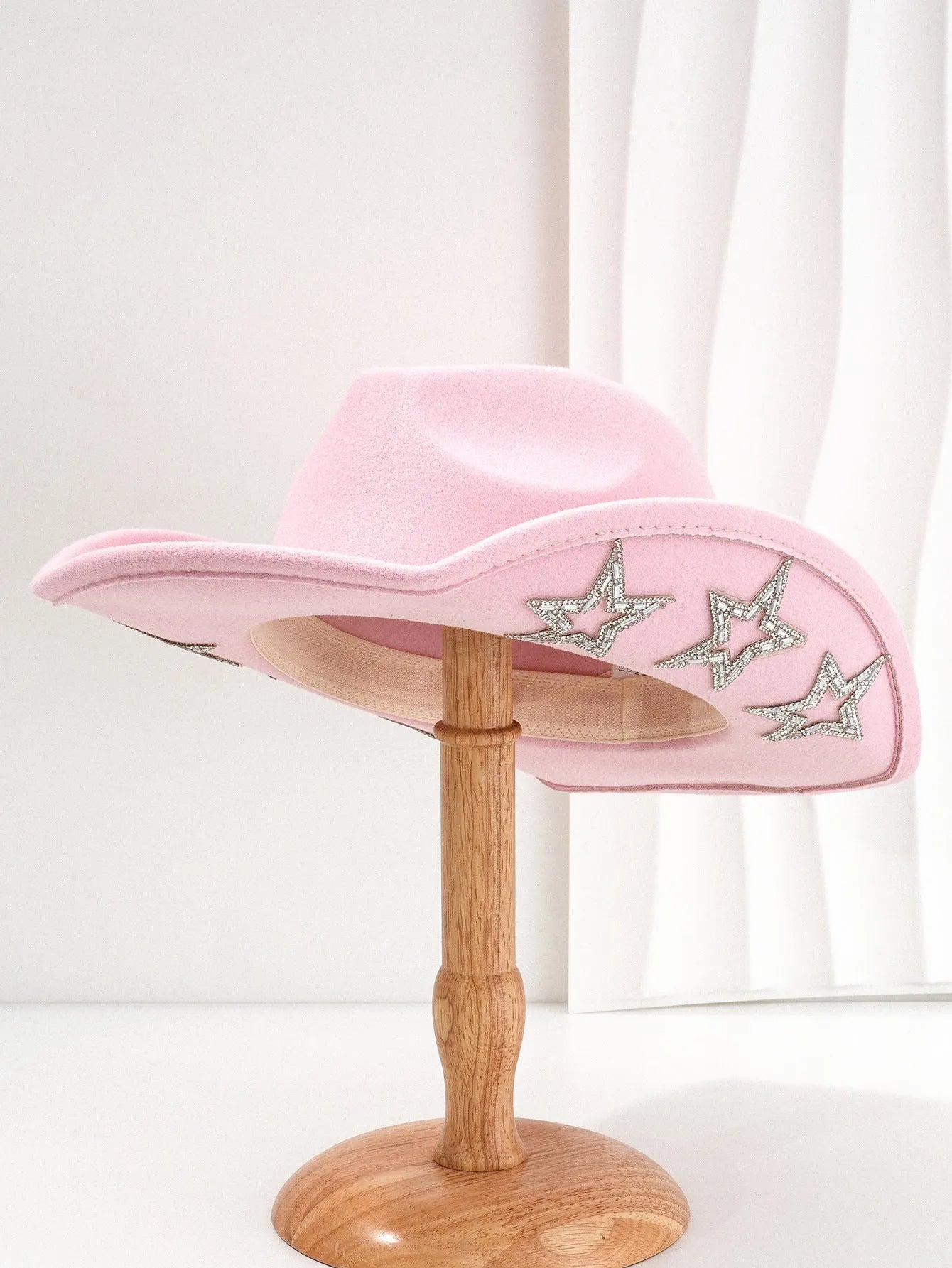 Polyester western top hat with hexagonal star design on conical crown in size M