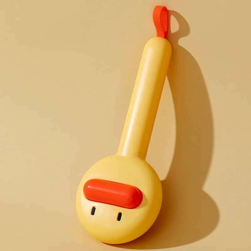 Small yellow duck-shaped pet grooming comb with open section design for cat and dog hair removal