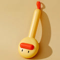Small yellow duck-shaped pet grooming comb with open section design for cat and dog hair removal