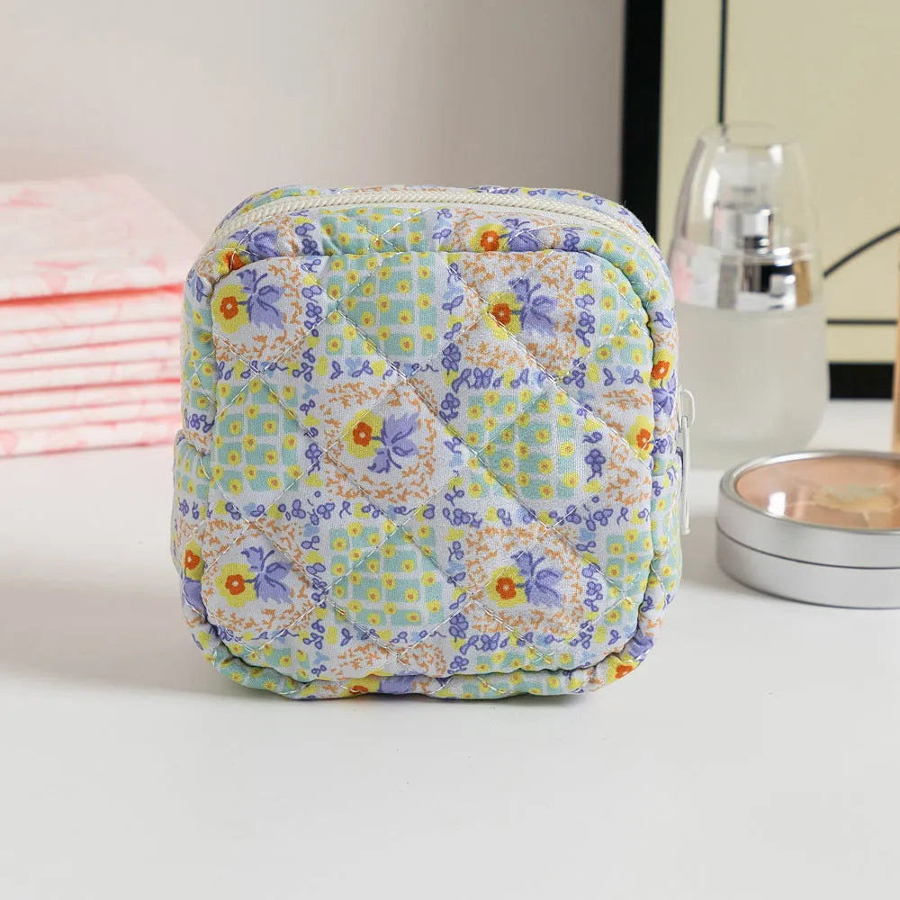 Breathable polyester key storage bag showing multiple floral and cherry pattern options including white background designs