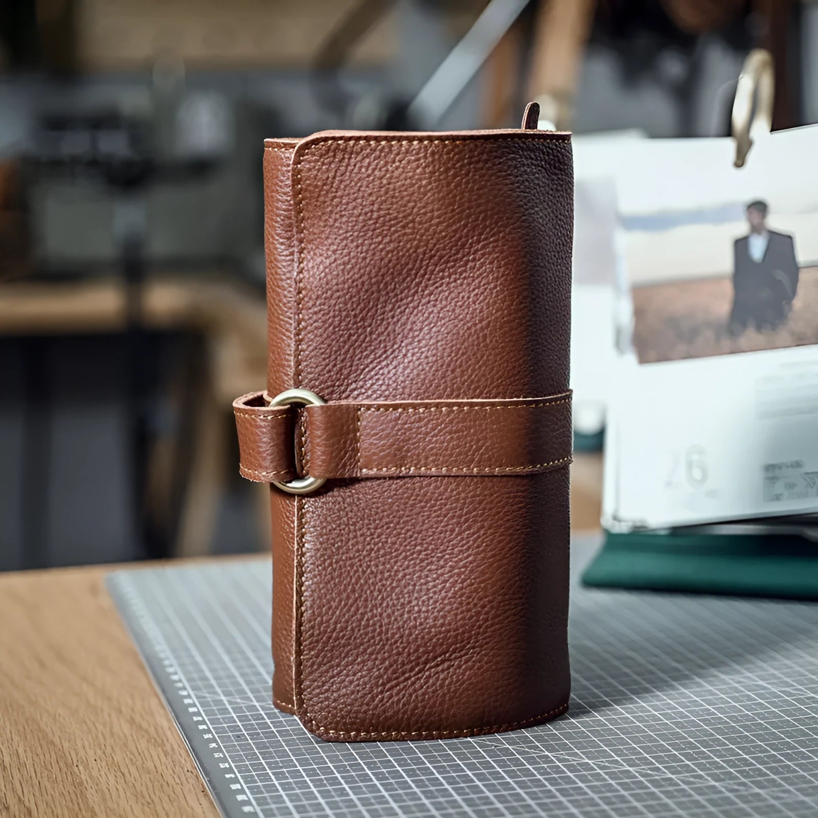 Handmade leather vintage wallet in black or dark brown with tape extraction closure showing 20cm length