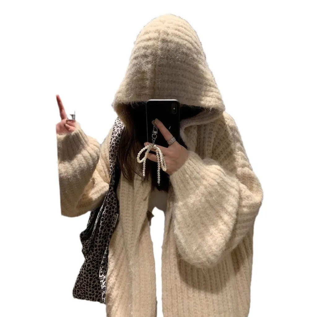 A woman's dark grey hooded cardigan with long sleeves, shown open in a loose fit.