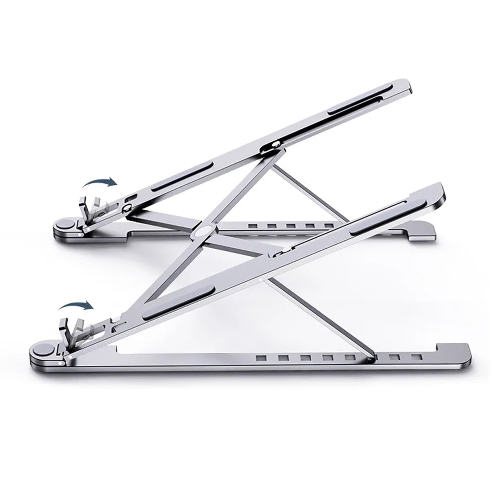 Aluminium laptop stand in silver colour, folded flat next to an open laptop for size comparison.
