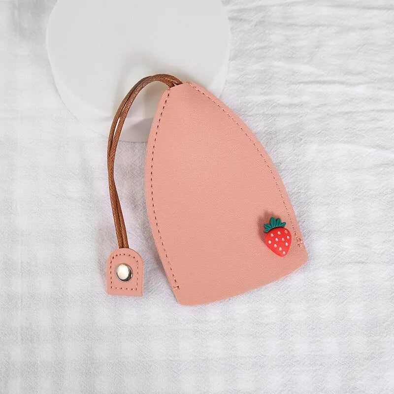 Cartoon design pull-out car key case made from soft PU leather, showing approximate size.