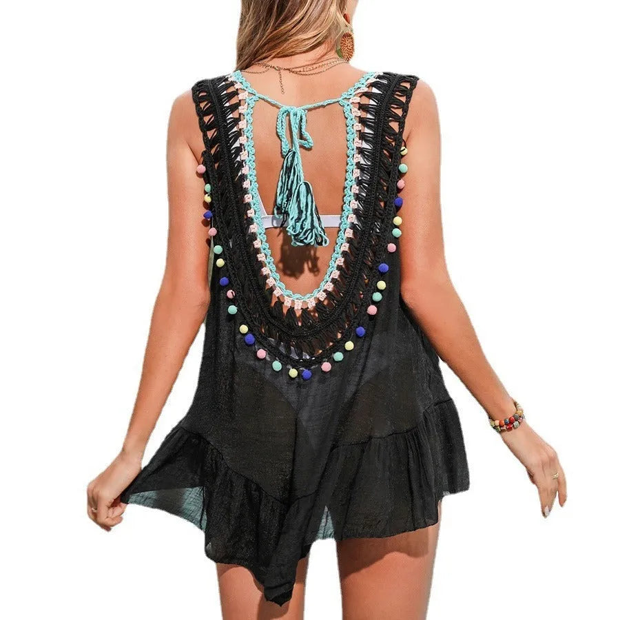 Black women's crochet beach cover-up with ruffled cut-out design, free size