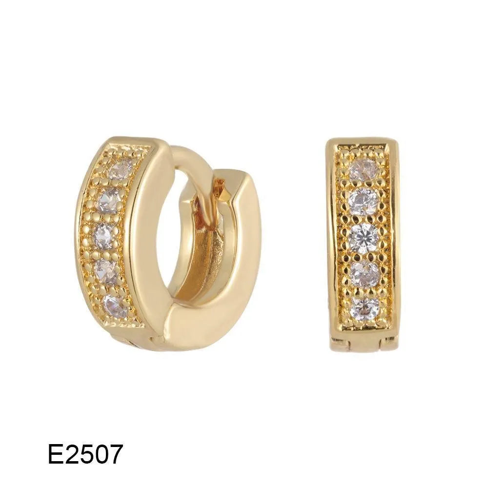 Gold plated brass heart-shaped ear clip earrings with zircon detail on a white background.