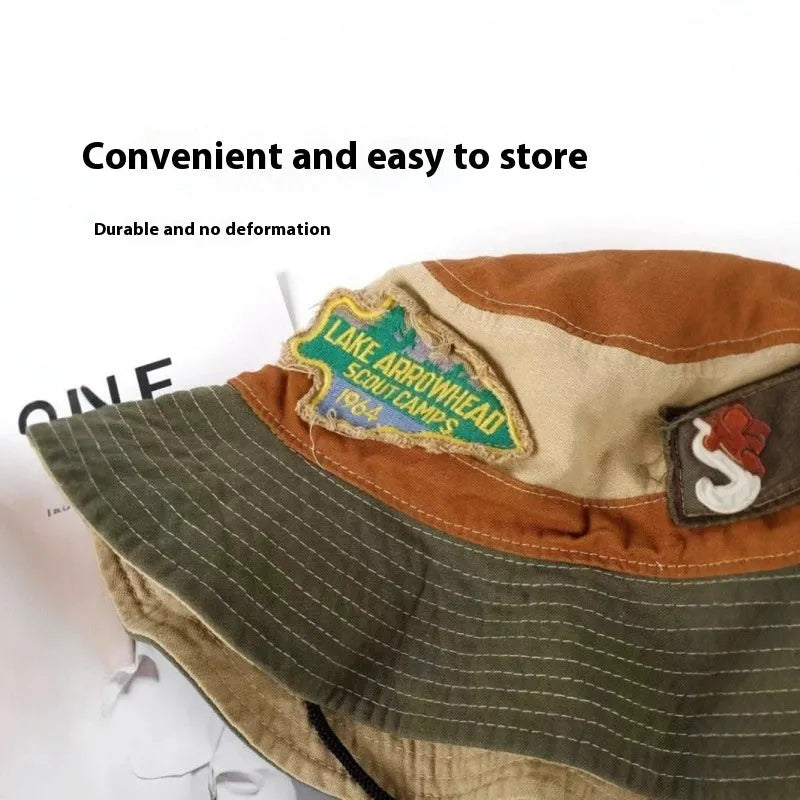 Army green cotton fisherman hat with flat top crown and patchwork hand-painted design