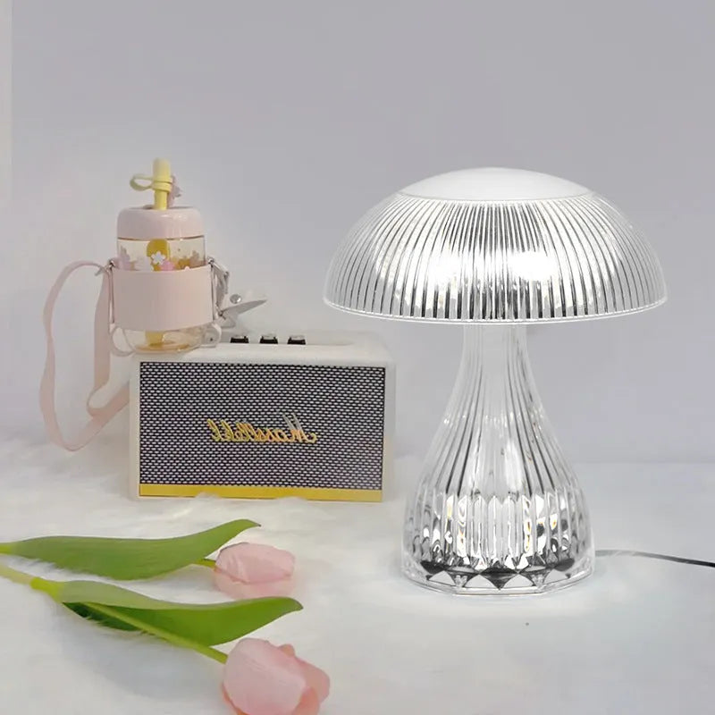 White acrylic USB rechargeable touch control table lamp with three colour settings.