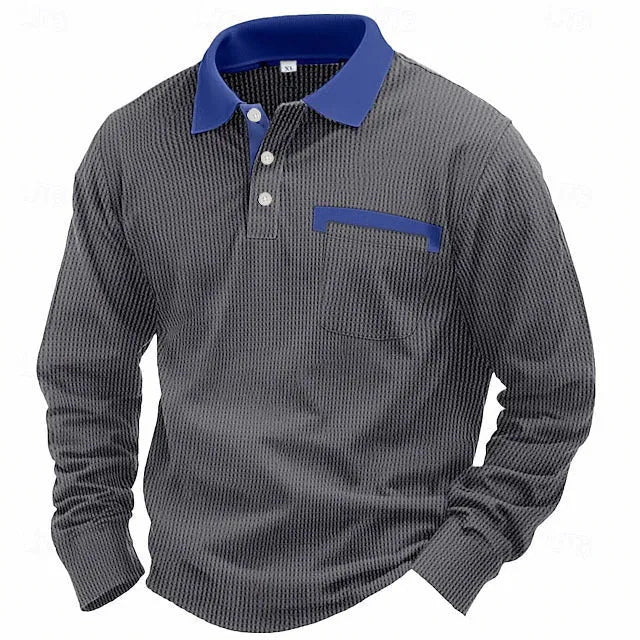 Man wearing a long-sleeve waffle-texture polo shirt in a loose retro fit, showing asymmetric design detail.