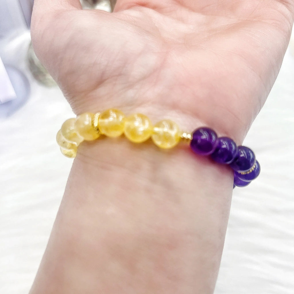Handmade women's amethyst crystal bracelet with yellow and purple colour combination