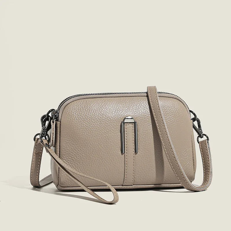 Women's genuine leather shoulder bag in square design with dimensions 19cm by 13cm by 6cm