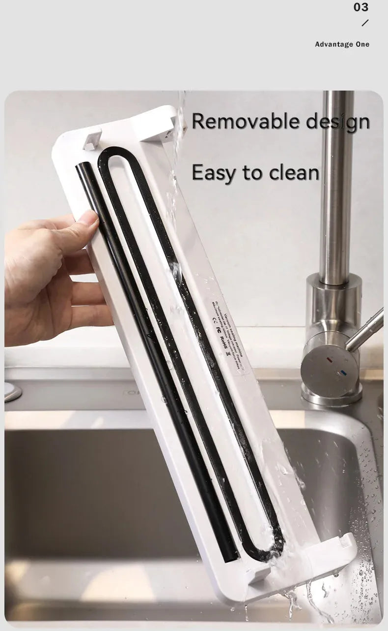 White automatic vacuum sealer machine with compact compression sealing design for household food preservation