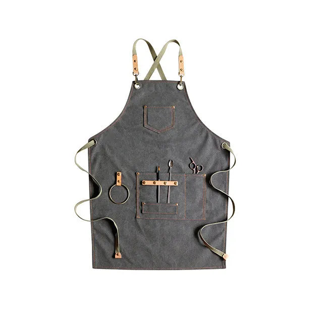 Canvas apron with cross back straps in camel colour for cafe and baking workwear