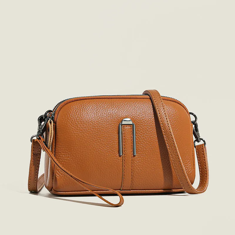 Women's genuine leather shoulder bag in square design with dimensions 19cm by 13cm by 6cm