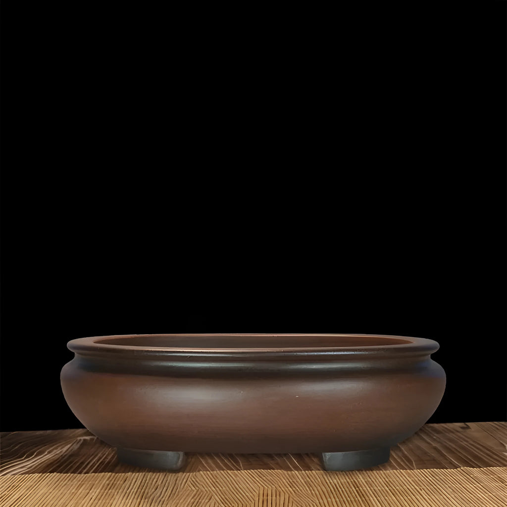 Handmade purple clay ceramic flowerpot measuring 58x47x18cm for indoor desktop plant displays.