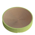 Green round cat scratching board with corrugated paper surface measuring 55 cm diameter