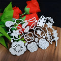 Silver carbon steel flower-shaped cutting mould measuring 14.3 by 9.9 centimetres