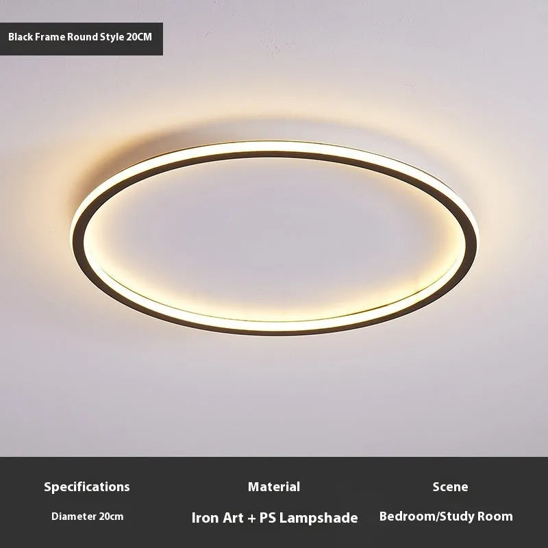 Minimalist circular ceiling lamp in black finish with dimmable LED lighting and three colour temperature options