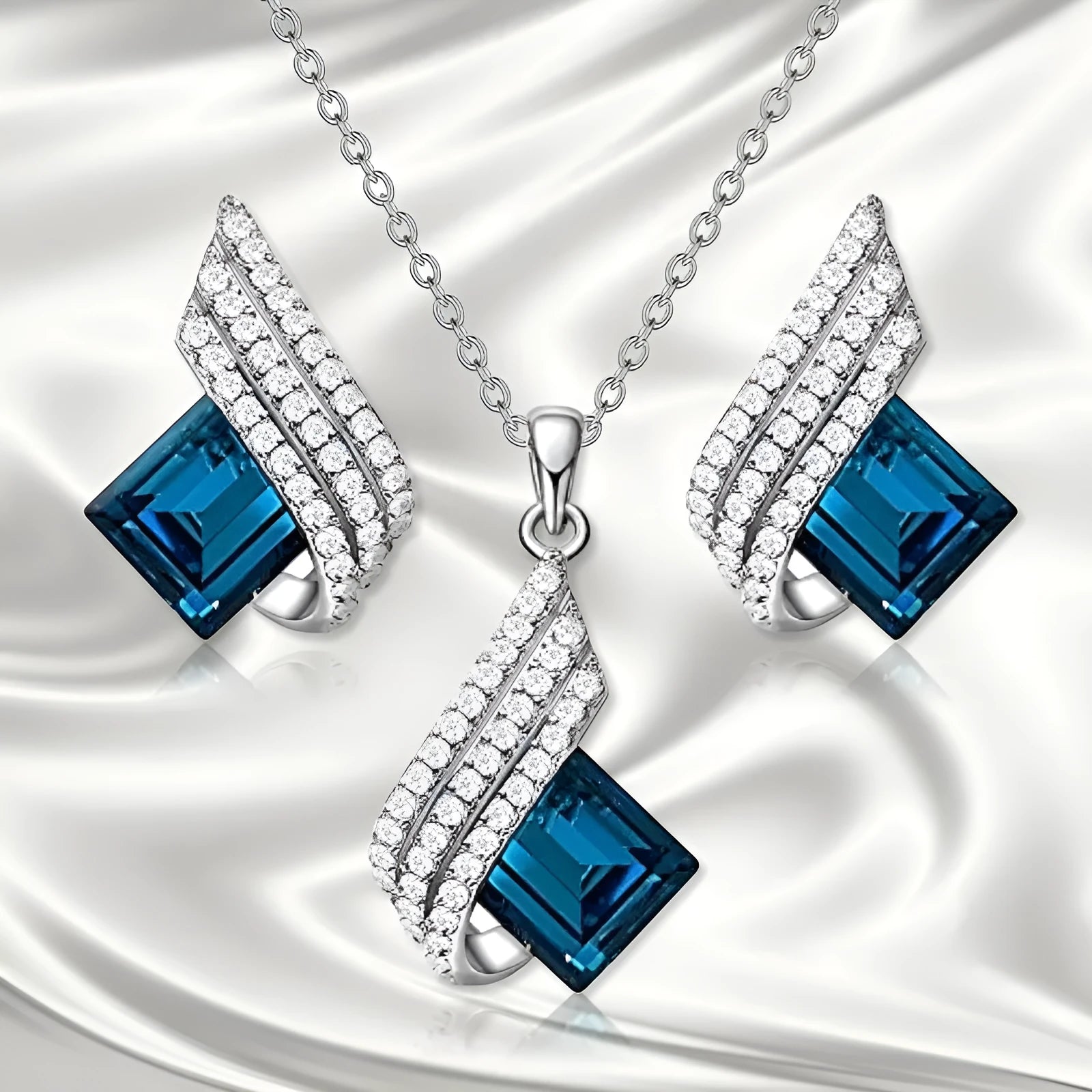 Women's alloy and glass cross chain necklace with matching electroplated ear studs set
