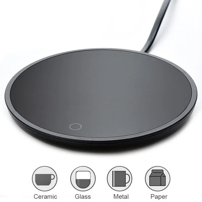 Black coffee mug warmer on desk showing 12cm diameter and low/high temperature switch