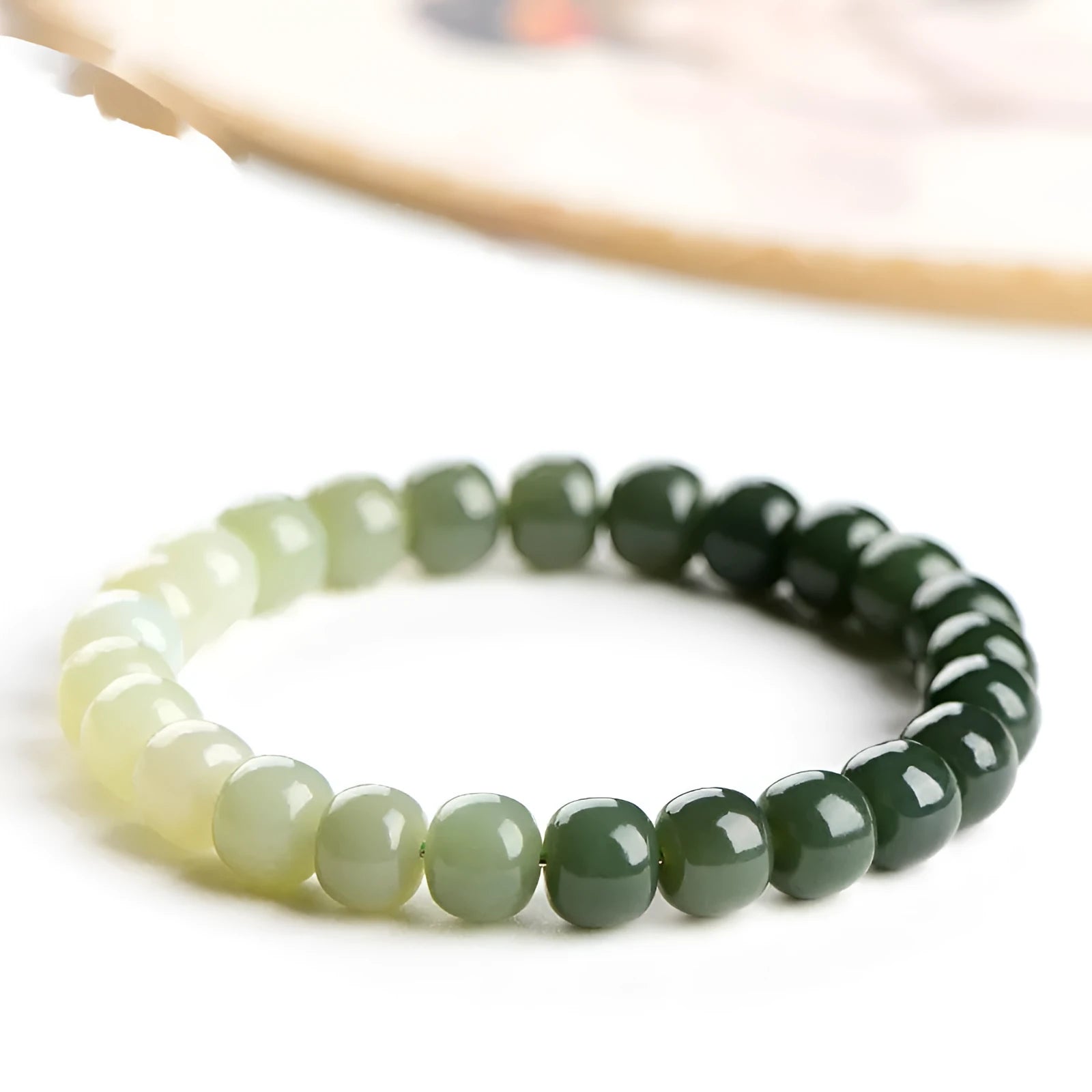 Hetian Jade Water Gradient Bracelet with polished oval beads in clear water colour.