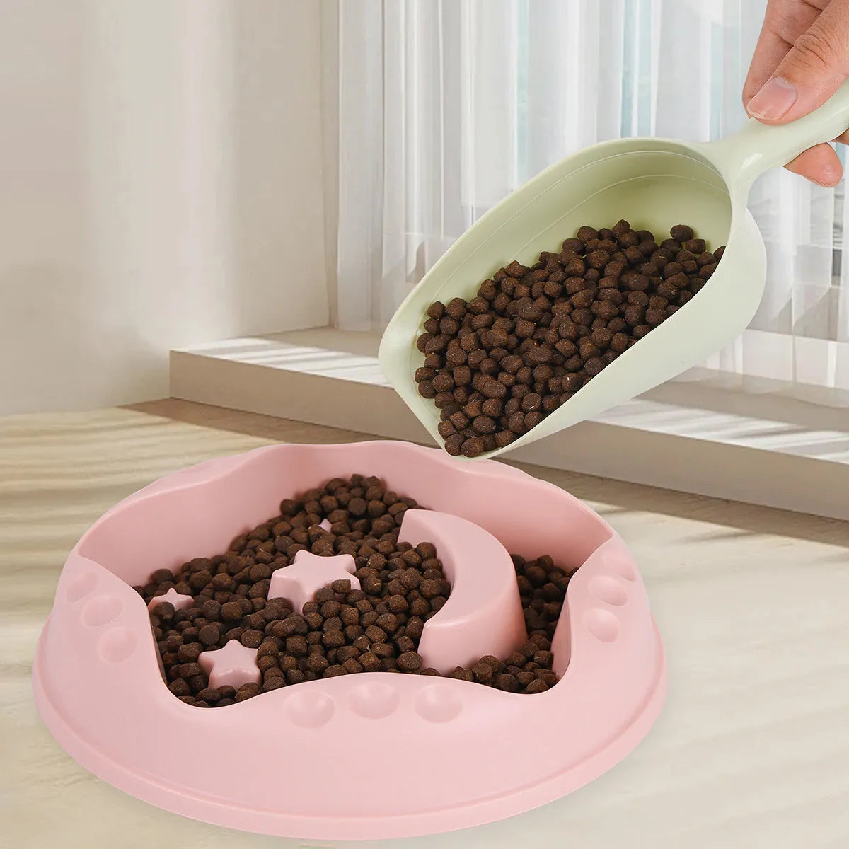 Blue star and wings design large plastic slow feeder dog bowl with maze pattern.