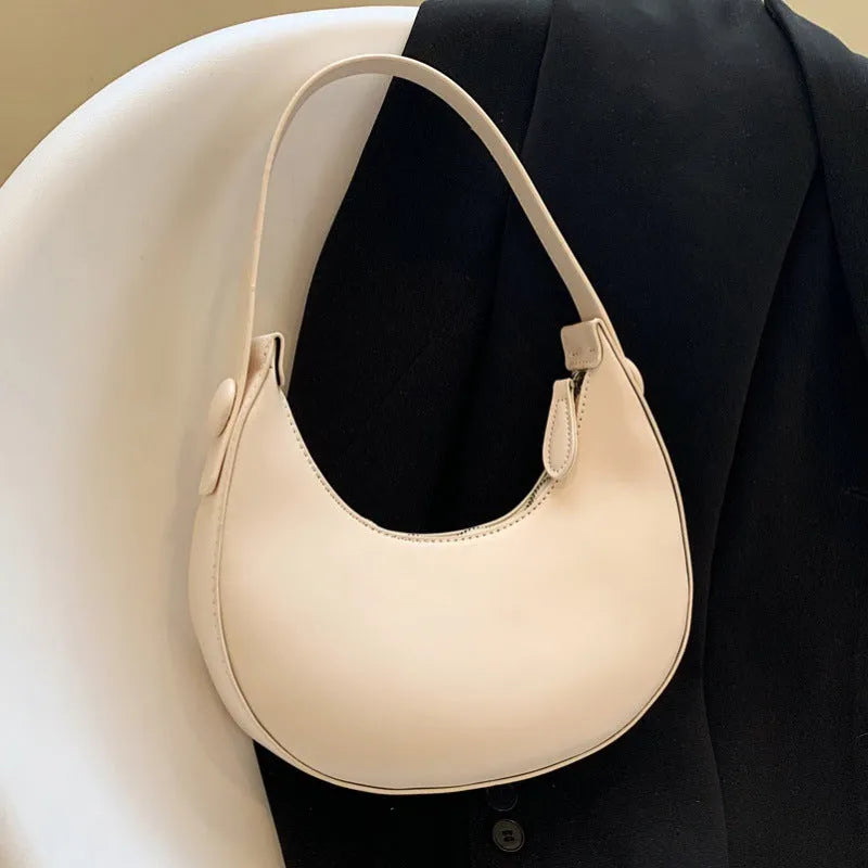 Women's retro shoulder bag in dumpling shape with sandwich pocket and zippered compartment