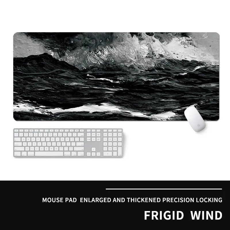 Oversized natural rubber gaming desk mat with graphical print, showing keyboard and mouse placement.
