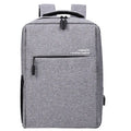 Black waterproof rechargeable backpack for a laptop, showing shoulder straps and a USB charging port.