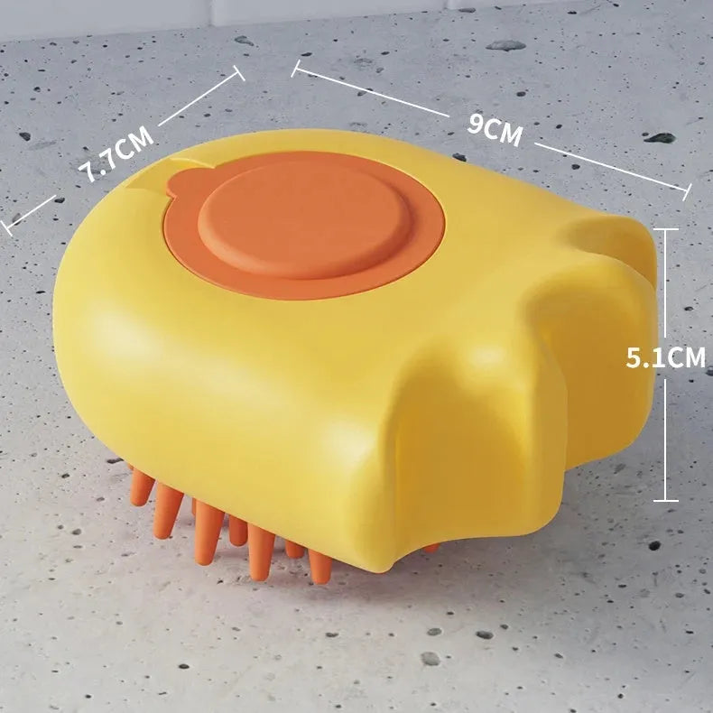 Plastic pet bath brush with built-in shampoo box measuring 9cm long