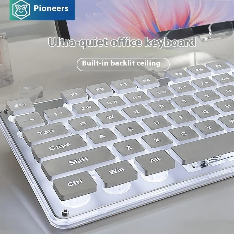 Wired mute keyboard with mechanical feel keys, shown in a Metal Black case with blue LED backlighting.