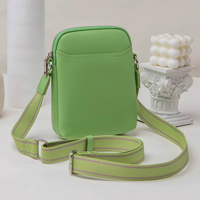 Solid colour PU leather crossbody phone bag for women shown in beige.